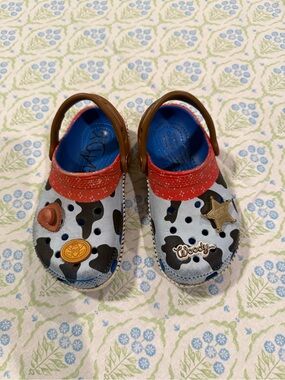 CROCS Kids Cowprint Clogs with Red Strap and Blue Insole